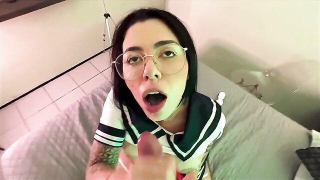 Asian tattooed alt girl in sailor cosplay with glasses licks finger POV