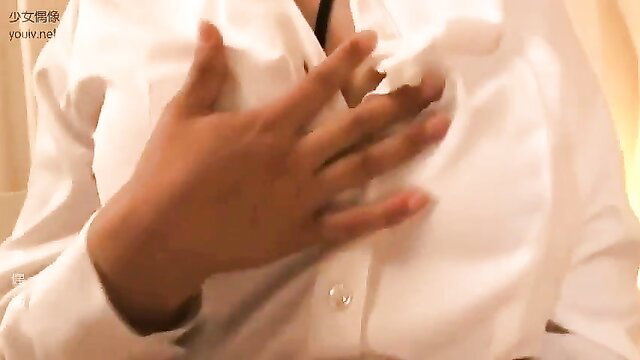 Hana Haruna groping her big tits in unbuttoned white shirt