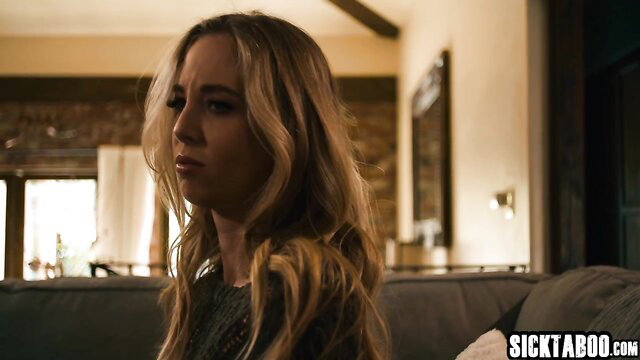 Blonde woman with worried expression in tense taboo scene