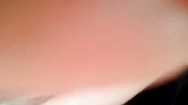 Blurry closeup of woman gargling huge cock in camper van