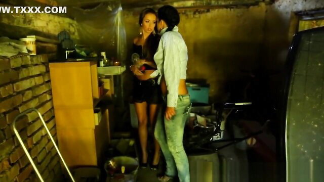 Two hot Euro babes in tight clothes fingering in garage
