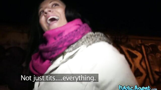 Smiling brunette in pink scarf says 'Not just tits... everything' Public Agent