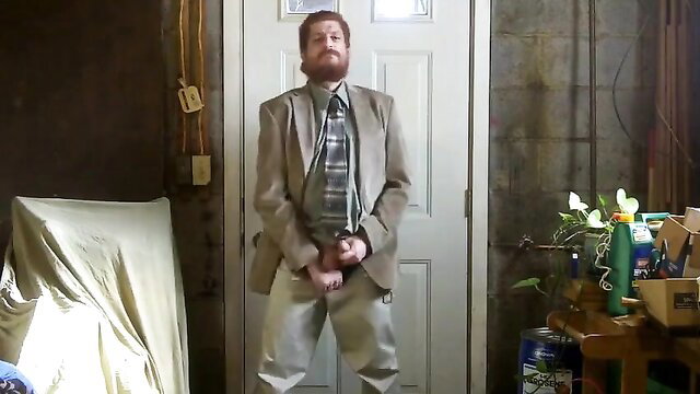 Israeli dad in suit jerks massive cock, trouser snake bulge