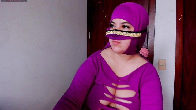Kalila_bilal in sexy purple hijab and ripped top, big tits tease