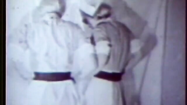 Vintage 2 Nurses stag film thumbnail, back view in uniforms