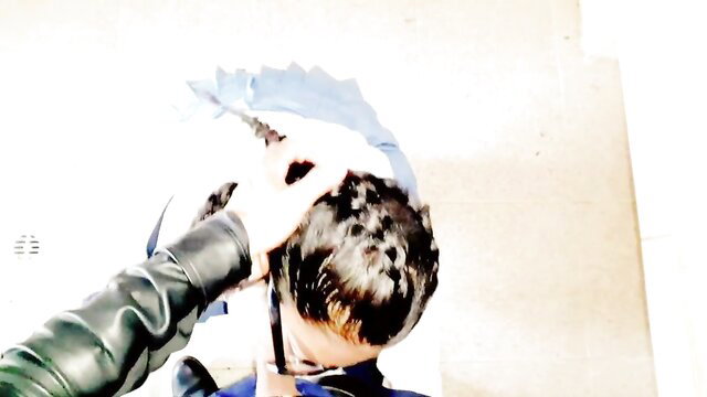 Danna Paola as student kneels for teacher in school bathroom