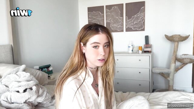 Abbey Rain in white blouse, blonde hair, teasing in bedroom