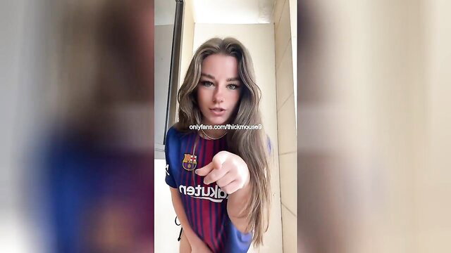 Hot 18yo blonde in tight Barcelona FC jersey pointing seductively