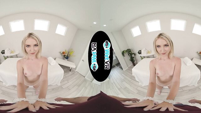 Blonde babe naked on bed in Wet VR Magic Touch POV