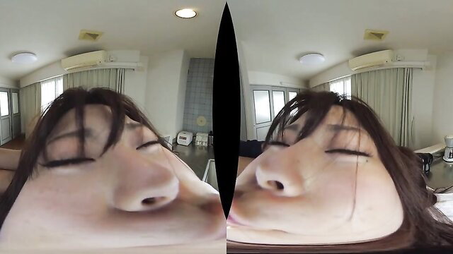 Distorted close-up of seductive Asian teen's face in VR POV porn