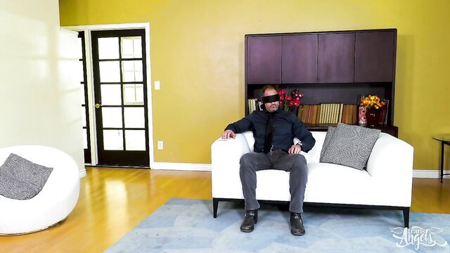 D Arclyte blindfolded in shirt and pants on sofa Trans Angels