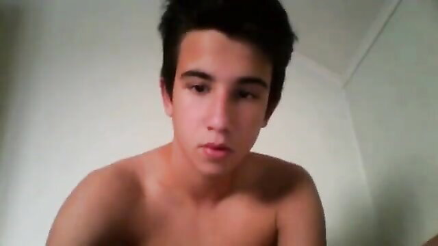 Shirtless Latino twink with messy black hair in webcam tease