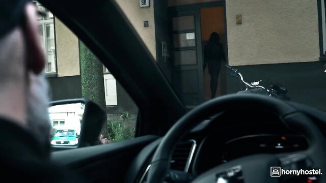 Old man in car spies on sexy brunette girl at door, voyeur tease