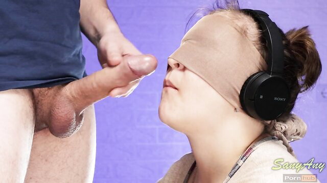 XSanyAny blindfolded with headphones sucks classmate's dick in taste game