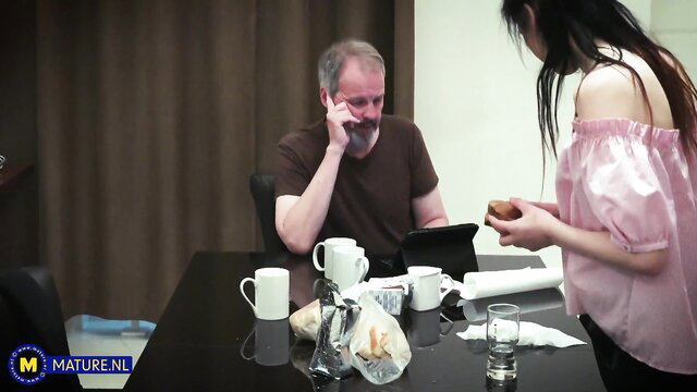 Slender Asian doll feeds grandpa snack before loud sex