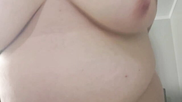 Big beautiful woman bouncing huge bare boobs in playful solo tease