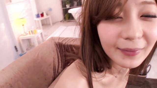 Rina Ishihara topless JAV tease with sultry smile closeup