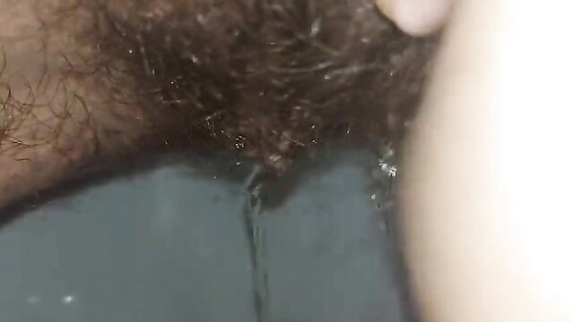 GinnaGg hairy MILF bush pussy closeup pissing long pee stream