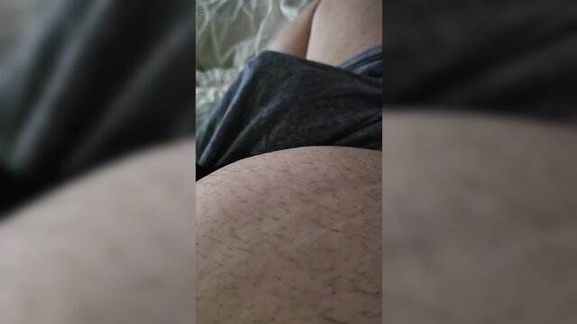 Curvy stepmom handjob tease on stepson's big bulge in bed