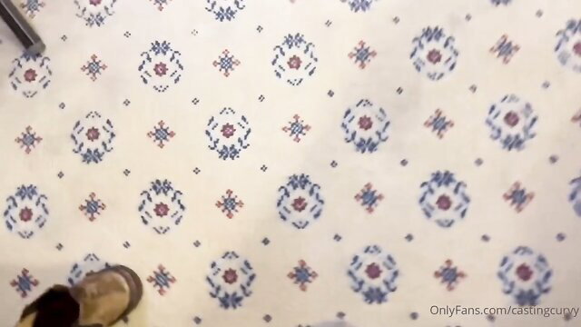 Lulu Lombardi on patterned fabric with pen and vase in amateur casting