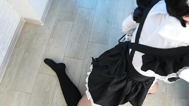 Kate Koss in sexy maid outfit kneeling with stockings
