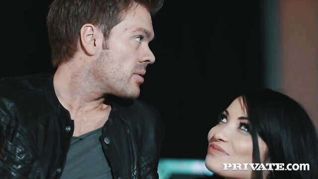 Lucia Love and Ryan Ryder intense eye contact in steamy scene