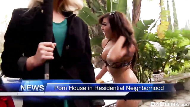 Hot Latina pornstar in bikini interviewed by busty blonde reporter at porn house