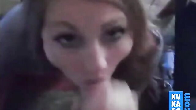 Closeup of amateur blonde with heavy makeup licking finger in teasing pose