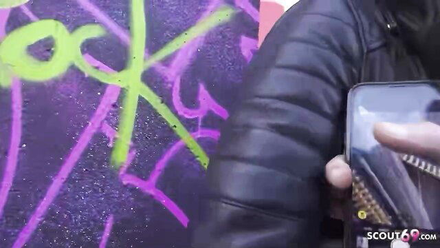 Skinny German cougar in leather jacket at graffiti wall, Scout69 assfucking casting tease