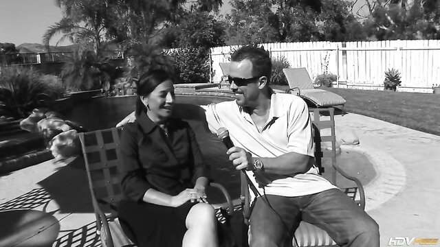 Melissa Monet alluring cougar chats poolside in sexy dress