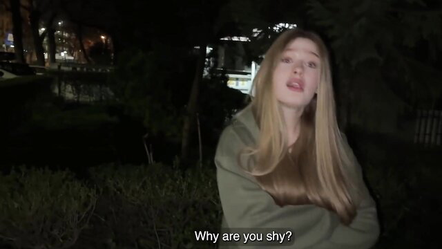 Hot blonde MILF in hoodie asks shy guy why at night street