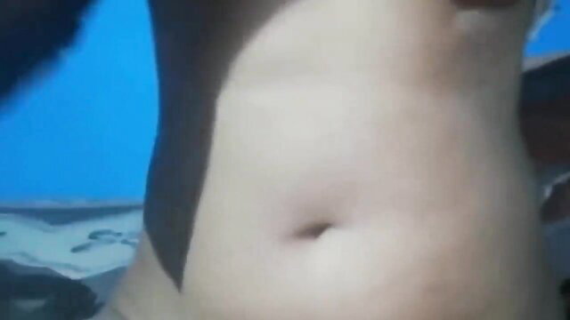 Closeup of sexy Mallu woman's smooth belly and navel in arousing tease