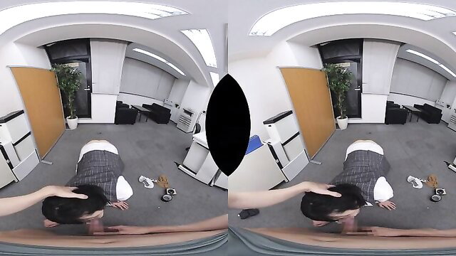 Japanese man in suit kneels for VR headjob from hand in office