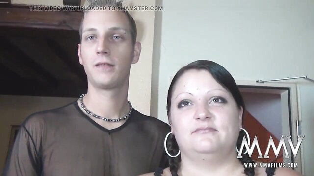 MMV Films couple at swinger club entrance, sheer top guy and curvy brunette woman