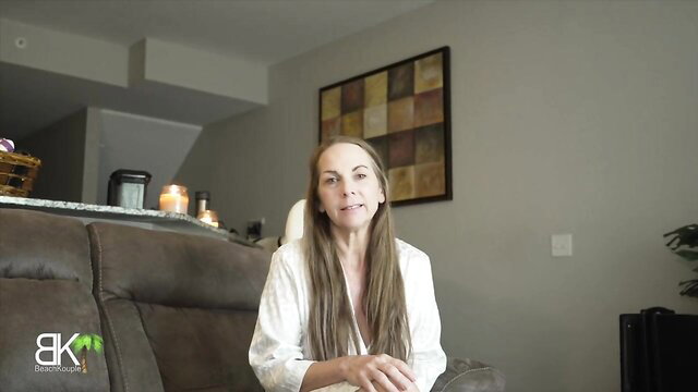 Mature blonde MILF in white robe on couch in taboo mom stepson bed share video