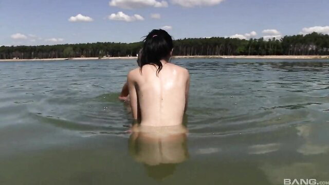 Nude brunette lesbians Ester & Sara in river at outdoor picnic sex adventure