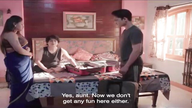 Indian tuition teacher aunt in saree with two young men on bed