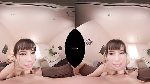 Tempting Japanese teen smiling seductively in VR POV adult clip