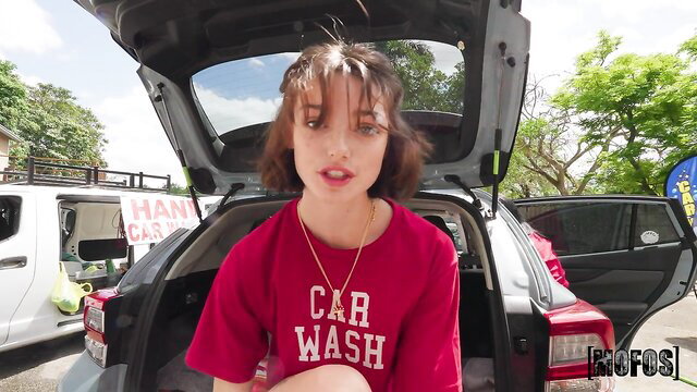 Cute brunette in red Car Wash shirt at outdoor car wash, Mofos
