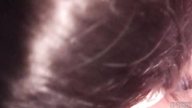 Blurry closeup of mature granny's face sucking dick in amateur blowjob