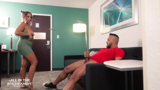 Hot blonde in green dress teases fit black man's bulge post-workout