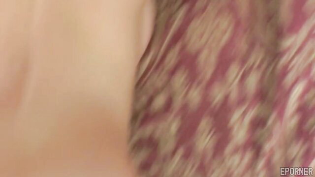 Steamy blonde girl in patterned dress closeup tease