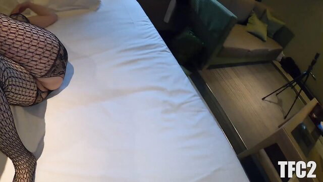 Japanese insurance aunt in full fishnet bodysuit on bed, amateur JAV