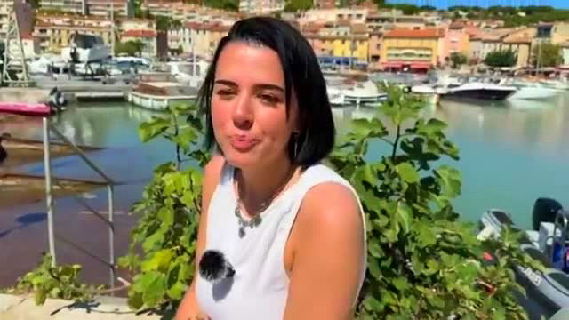 Rose 20yo French vet student smiling in white tank top by marina