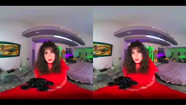 Nikki Slick as Lydia from Beetlejuice in red dress & black gloves VR cosplay