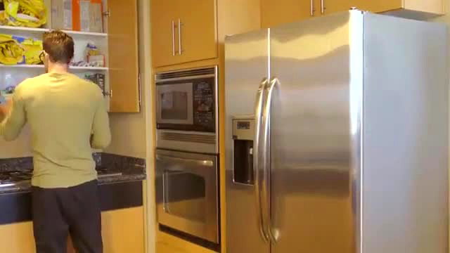 Man in kitchen with fridge cabinets, no nudity - Haley Reed scene