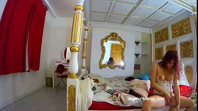 Redhead cam girl spreads tight pussy on Voyeur House