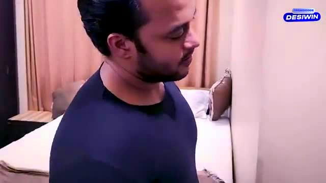 Handsome Indian man profile view in dim bedroom, hot romantic vibe