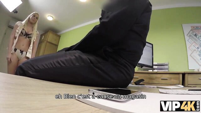 Blonde babe in lingerie stands by suited man seated at desk