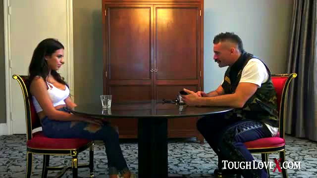 Autumn Falls in white top with Charles Dera at ToughLove table talk